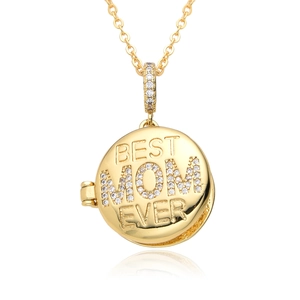 Detailed view of Best Mom Ever spinning pendant in gold with micro-pave zirconia
