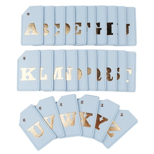 Set of 26 light blue PU leather luggage tags with gold hollow letters A-Z and eyelets
