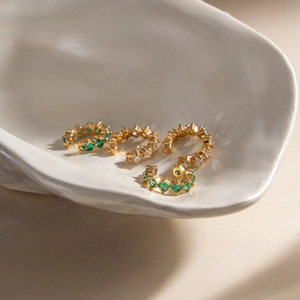 Set of four 18K gold plated stainless steel ear cuffs with green and clear zircon stones
