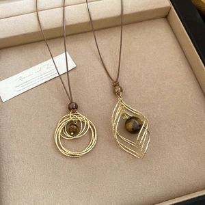 Maillard style tiger eye stone geometric pendant necklace with retro gold metal rings