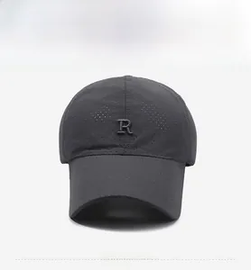 Detailed close-up of dark grey breathable mesh baseball cap with R letter embroidery