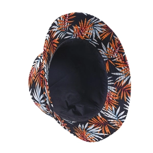 Detail of tropical palm leaf print bucket hat with black lining and orange foliage