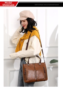 Side view of woman carrying a retro dark brown PU leather tote bag with zip pocket detail