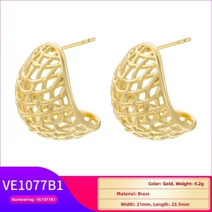 Detailed view of hollow woven texture gold brass earrings with 21mm width dimensions
