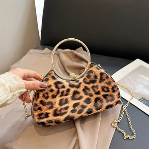 Leopard print evening clutch bag with gold ring handle and metal chain strap