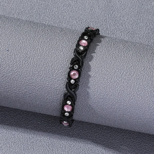 Hip-hop magnetic energy bracelet in black metal with pink and white rhinestones