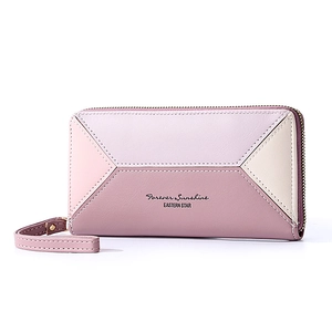 Detail of pink and purple patchwork long wallet with zip and Forever Sunshine wrist strap