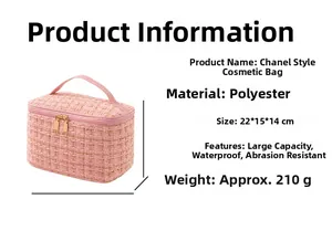 Pink tweed cosmetic bag with double gold zippers and dimensions of 22x15x14cm