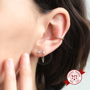 S925 silver needle drop zircon earrings set with chain and cuff in golden finish
