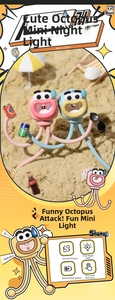 Mini octopus night light with flexible tentacles shown in a creative beach diorama