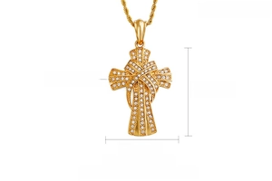 Detail view of 18K gold plated cross pendant with zircon stones and 54mm by 38mm dimensions