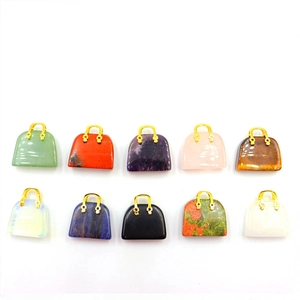 Mini handbag pendants carved from natural crystals with gold handles in various colors