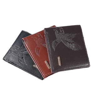 Slim men's bifold wallet with eagle embossed pattern in black brown leather pattern and metal detail