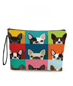 Detailed pattern display of colorful pop art puppy prints on the portable makeup bag