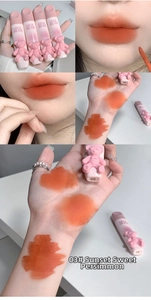 Detail view of Gege Bear velvet matte lip mud in Sunset Sweet Persimmon with bear decor
