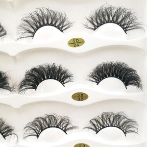 6D Russian curly false eyelashes in a white tray featuring dense volume and 5D style