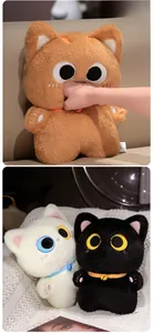 Close-up of soft cat plush showing high elasticity with multiple color variants and bell collars