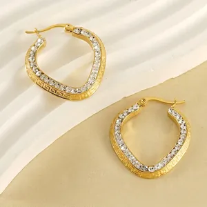 Gold plated stainless steel hoop earrings with crystals and Greek fret pattern