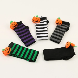 Detailed view of Halloween striped socks with cute plush pumpkin decorations in five styles