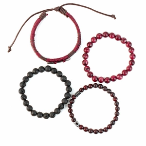 Detail of 4-piece multilayer bracelet set with tiger eye, lava stone and woven rope