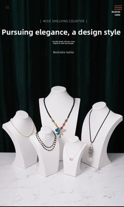 Five-piece set of white jewelry neck displays for necklace exhibition on marble