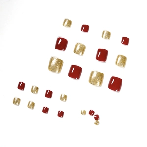 Set di 24 unghie finte per piedi rosso scuro e glitter oro per uno stile estivo