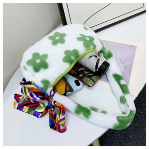 Top view of white plush tote bag showing internal storage space with daily essentials