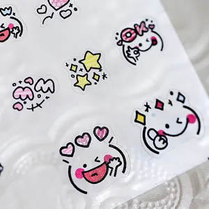 Autocollants 5D pour ongles avec motifs emoji et cœurs sur fond blanc gaufré
