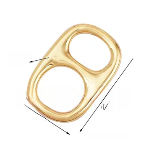 Detailed view of golden soda tab charms with specific dimensions for DIY jewelry making