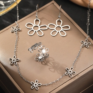 Elegant stainless steel jewelry set featuring a hollow five-petal flower necklace, earrings, and ring