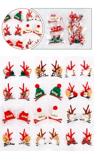 Flat lay of 12 pairs of Christmas hair clips with reindeer antlers and knit hats