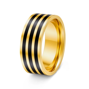8mm wide gold stainless steel ring for men with three black enamel stripes on white background