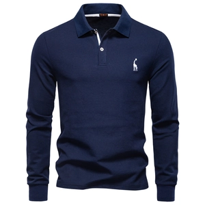 Detail of navy blue long sleeve polo shirt with white giraffe logo and collar texture