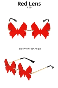 Detail view of red butterfly rimless sunglasses with gold metal temples and plastic tips