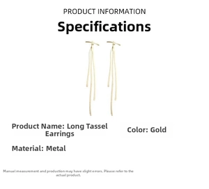 Detailed view of long gold tassel earrings with multiple metal chains on white background