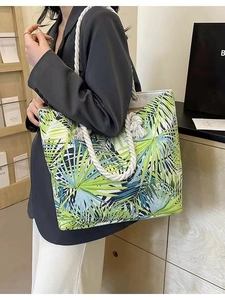 Large canvas tote bag with tropical palm leaf print and thick cotton rope handles