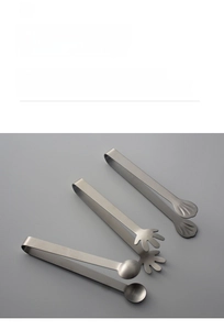 Detail of stainless steel mini tongs set featuring spoon, hand, and shell head designs