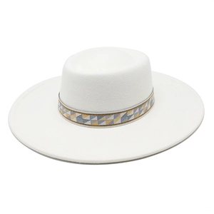 White boater hat with wide brim and decorative colorful geometric patterned ribbon