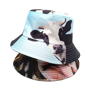 Fashionable cow print bucket hat set with realistic animal pattern for outdoor sun protection