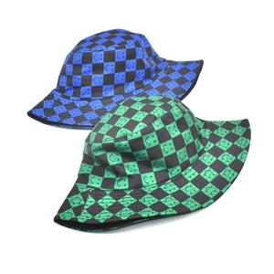 Checkered smiley face bucket hat in blue and green patterns for outdoor sun protection