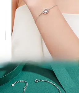 Close-up of S925 sterling silver bracelet with oval moonstone and lobster clasp detail
