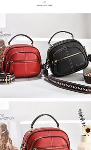Detail of multi-layer crossbody bag with contrast stitching and adjustable wide strap