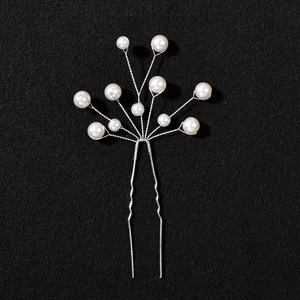 Handmade bridal hair pin with elegant white pearls and silver U-shaped metal fork for wedding