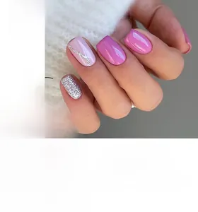 Short square press-on nails with lavender purple, wavy pink, and silver glitter textures