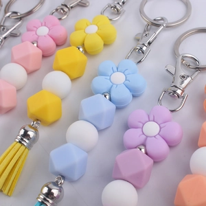 Colorful silicone bead bracelet keychain with flower charms and stylish tassels for bags