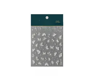 Detailed 5D embossed nail stickers featuring white butterflies and floral star patterns