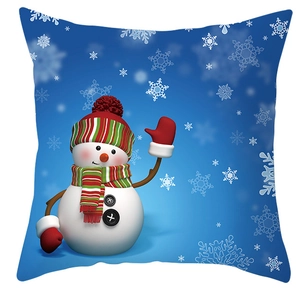 Detailed view of winter pillow cover featuring a cute snowman with blue snowflake patterns