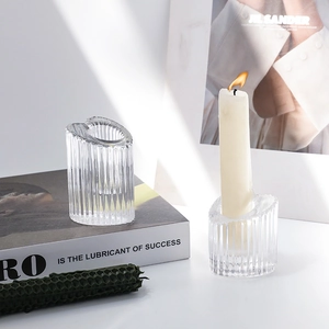 Vertical striped crystal glass candle holder with organic curved rim for dining decor