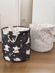 Set of two dog-patterned foldable laundry baskets in black and white canvas with rope handles