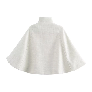 Women's elegant white tweed cape coat with sophisticated woven texture in a back view